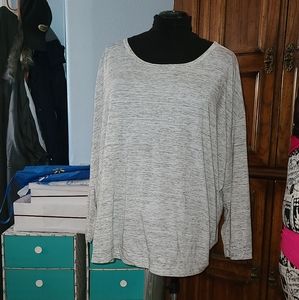 Gray shirt. Woman within. 4x